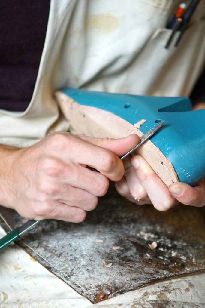 Craftsman shaping footwear